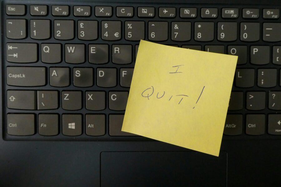 A yellow sticky note with the words 