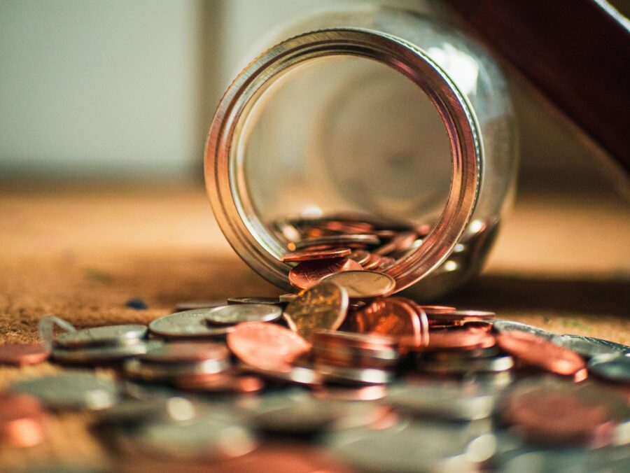 A jar of coins spilled over.