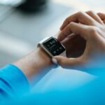 Move More, Work Better: Fitness Strategies Every Manager Should Encourage person using Apple Watch smartwatch